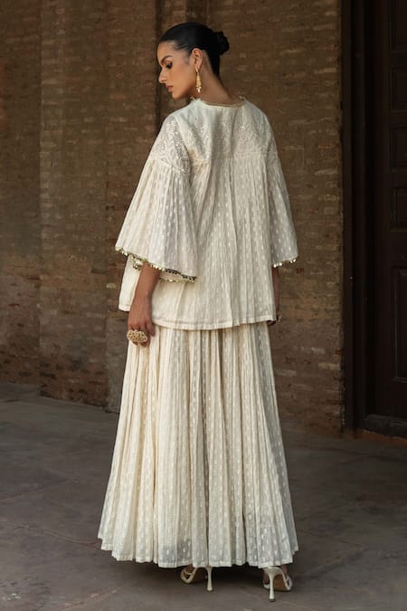 Shop Preevin Off White Cotton Sequins Round All Gathers Forest Embroidered Top With Skirt at Aza Fashions Shop_Preevin_Off White Cotton Sequins Round All Gathers Forest Embroidered Top With Skirt _at_Aza_Fashions