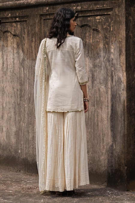 Shop Preevin Off White Cotton, Tulle Sequins, Big Border Straight Sharara Set With Dupatta at Aza Fashions Shop_Preevin_Off White Cotton, Tulle Sequins, Big Border Straight Sharara Set With Dupatta _at_Aza_Fashions