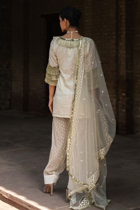 Shop Preevin Off White Cotton, Tulle Sequins, Embroidery Fringe Kurta And Farshi Salwar Set at Aza Fashions Shop_Preevin_Off White Cotton, Tulle Sequins, Embroidery Fringe Kurta And Farshi Salwar Set _at_Aza_Fashions