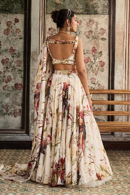 Shop Diyarajvvir Ivory Crepe, Organza Sequins, Beads, Embroidery V-neck Floral Print Lehenga Set at Aza Fashions Shop_Diyarajvvir_Ivory Crepe, Organza Sequins, Beads, Embroidery V-neck Floral Print Lehenga Set _at_Aza_Fashions