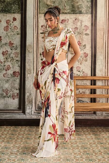 Diyarajvvir Ivory Crepe Sequins, Beads Square Neck Floral Print Pre-draped Saree Set at Aza Fashions Diyarajvvir_Ivory Crepe Sequins, Beads Square Neck Floral Print Pre-draped Saree Set _at_Aza_Fashions