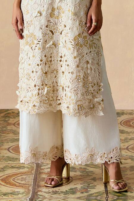 Buy_Chandrima_Ivory Chanderi Cut Work, Embroidery Round Neck Cutwork Kurta And Flared Pants Set _Online_at_Aza_Fashions