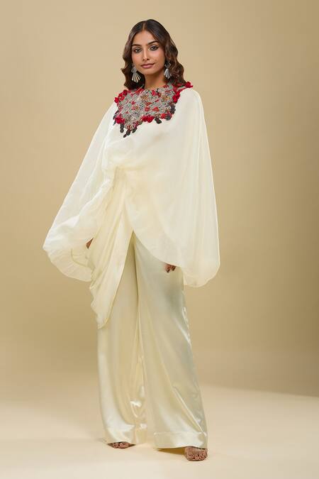 Anamika Khanna Ivory Round Neck Draped Pant And Capelet Set at Aza Fashions Anamika Khanna_Ivory Round Neck Draped Pant And Capelet Set _at_Aza_Fashions