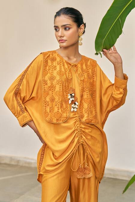 Buy_Vidushi Gupta_Yellow Modal, Silk, Cotton Tassels Round Neck Designer Ochre Kurta Pant Set _Online_at_Aza_Fashions