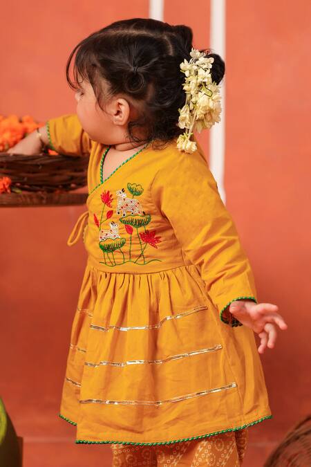 Cute Couture_Mustard Cotton Embroidery Radha Rani Peplum Kurta And Dhoti Pant Set _Online_at_Aza_Fashions