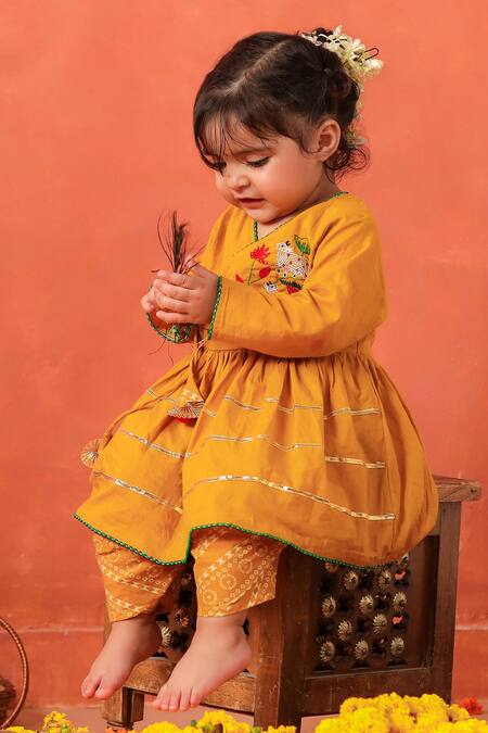 Buy_Cute Couture_Mustard Cotton Embroidery Radha Rani Peplum Kurta And Dhoti Pant Set _Online_at_Aza_Fashions