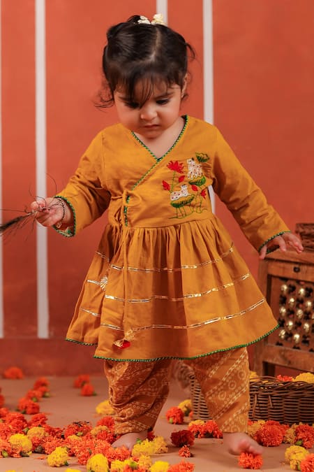 Shop_Cute Couture_Mustard Cotton Embroidery Radha Rani Peplum Kurta And Dhoti Pant Set _Online_at_Aza_Fashions