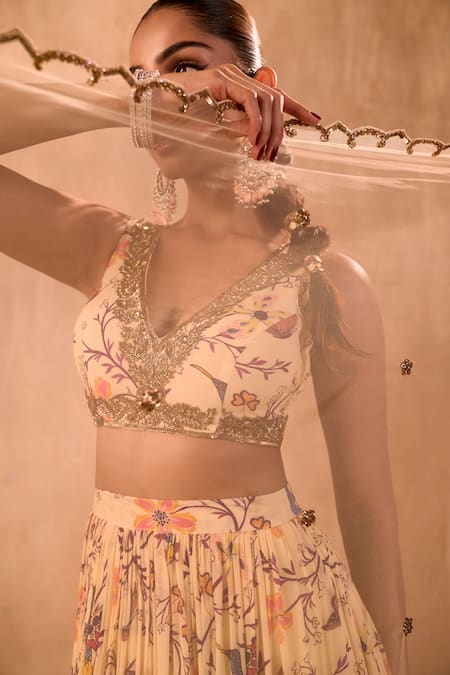 Mehak Murpana X AZA_Ivory Crepe, Net Embroidery, Zari V-neck Floral Print Layered Lehenga Set _at_Aza_Fashions