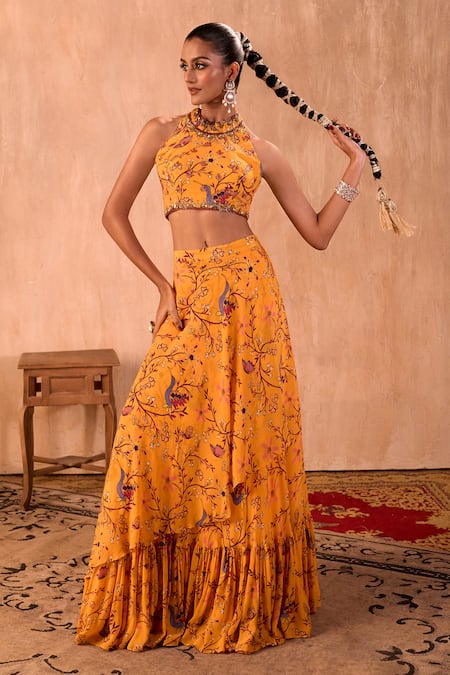 Mehak Murpana X AZA Yellow Crepe Tassels Halter Neck Floral Print Blouse And Layered Lehenga Set 