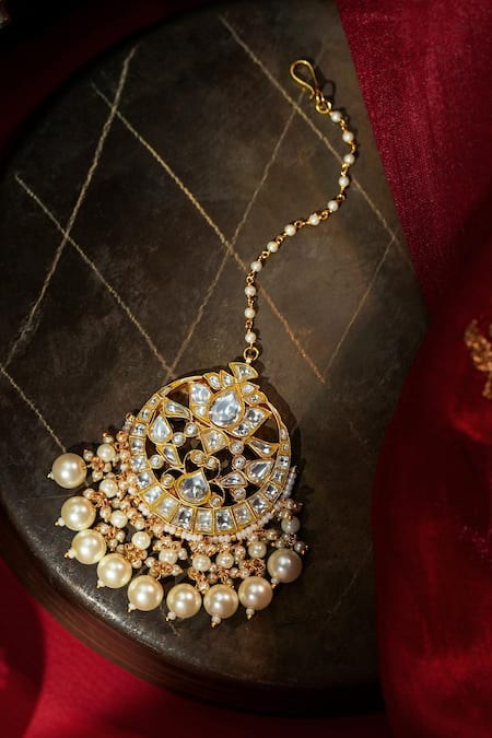 Shop Riana Jewellery White Pearl Embellished Maangtikka at Aza Fashions Shop_Riana Jewellery_White Pearl Embellished Maangtikka _at_Aza_Fashions
