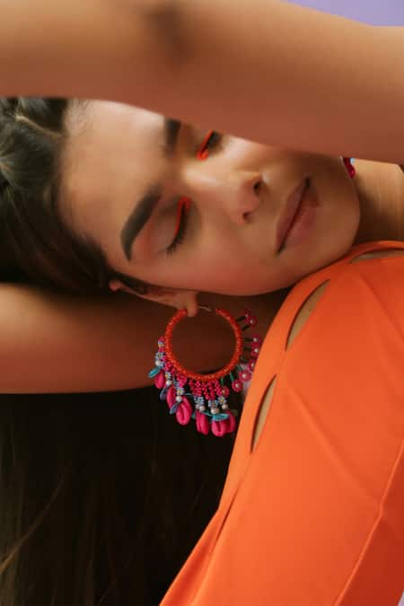 NAKHREWAALI Pink Beads, Tassels Shararat Beaded Asymmetric Hoop Earrings Online at Aza Fashions NAKHREWAALI_Pink Beads, Tassels Shararat Beaded Asymmetric Hoop Earrings _Online_at_Aza_Fashions