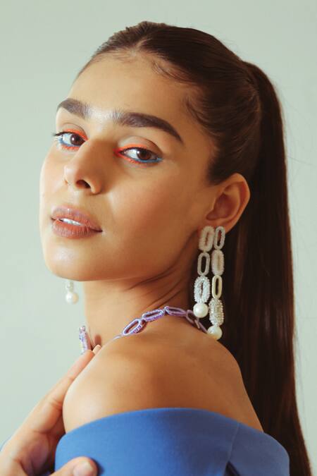 Buy NAKHREWAALI White Embroidery Glow Up Long Pearl Drop Earrings Online at Aza Fashions Buy_NAKHREWAALI_White Embroidery Glow Up Long Pearl Drop Earrings _Online_at_Aza_Fashions