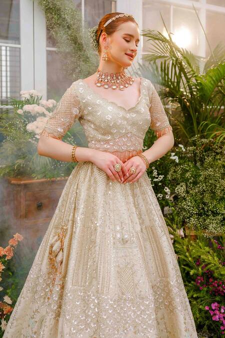 Shop_Tamaraa By Tahani_Ivory Silk, Net Crystals, Sequins, Beads Arisa Garden 12 Kali Lehenga Set _Online_at_Aza_Fashions