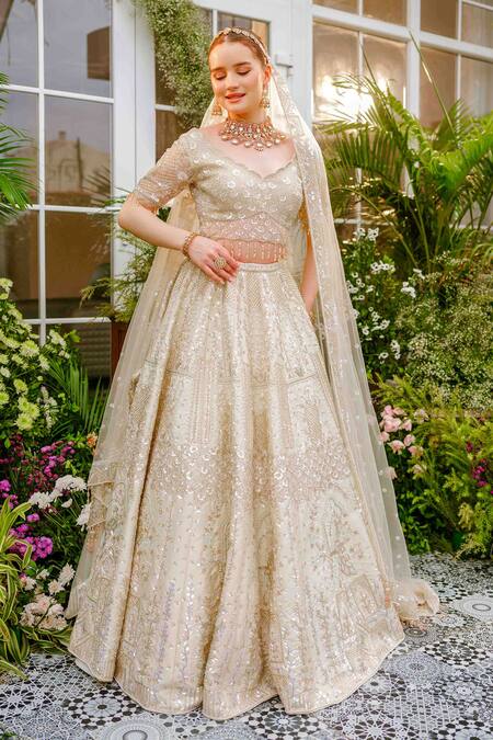 Buy_Tamaraa By Tahani_Ivory Silk, Net Crystals, Sequins, Beads Arisa Garden 12 Kali Lehenga Set 