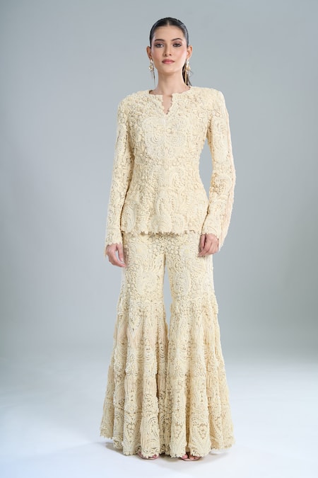 Shop Anamika Khanna Ivory Embroidery, Fringe Split V-neck Peplum Top And Sharara Set Online at Aza Fashions Shop_Anamika Khanna_Ivory Embroidery, Fringe Split V-neck Peplum Top And Sharara Set _Online_at_Aza_Fashions