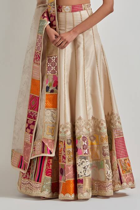 Kavita Bhartia_Ivory Brocade, Organza Patchwork, Embroidery, Zari, Gota Patch Work Lehenga Set _at_Aza_Fashions