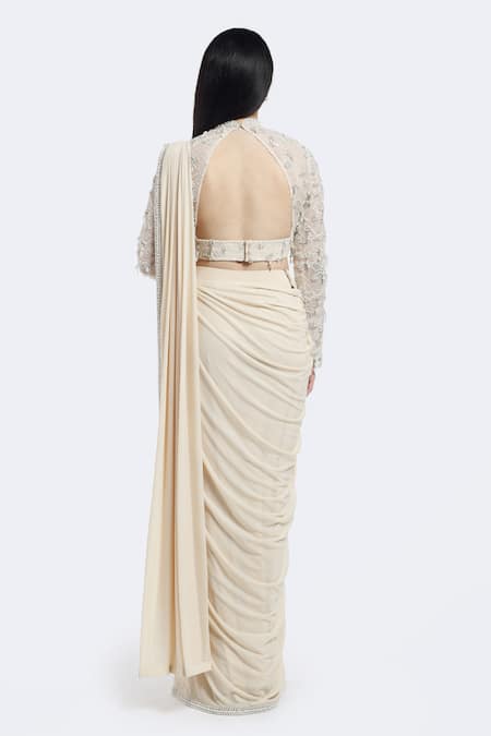 Shop Onaya Off White Lycra Cut Work, Sequins, Pre-draped Saree And Embellished Blouse Set at Aza Fashions Shop_Onaya_Off White Lycra Cut Work, Sequins, Pre-draped Saree And Embellished Blouse Set _at_Aza_Fashions