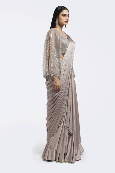 Onaya Beige Satin Sequins, Beads V-neck Pre-draped Saree And Embellished Blouse Set Online at Aza Fashions Onaya_Beige Satin Sequins, Beads V-neck Pre-draped Saree And Embellished Blouse Set _Online_at_Aza_Fashions