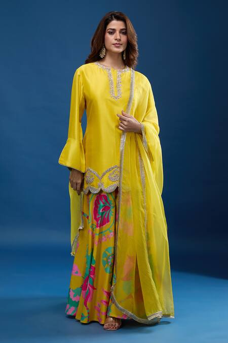 Archana Shah Yellow Embroidery Round Neck Short Kurta Suzani Sharara Set at Aza Fashions Archana Shah_Yellow Embroidery Round Neck Short Kurta Suzani Sharara Set_at_Aza_Fashions