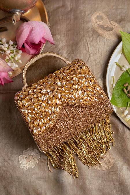 Shop Bhavna Kumar Gold Crystals, Tassels Embellished Boho Clutch at Aza Fashions Shop_Bhavna Kumar_Gold Crystals, Tassels Embellished Boho Clutch_at_Aza_Fashions