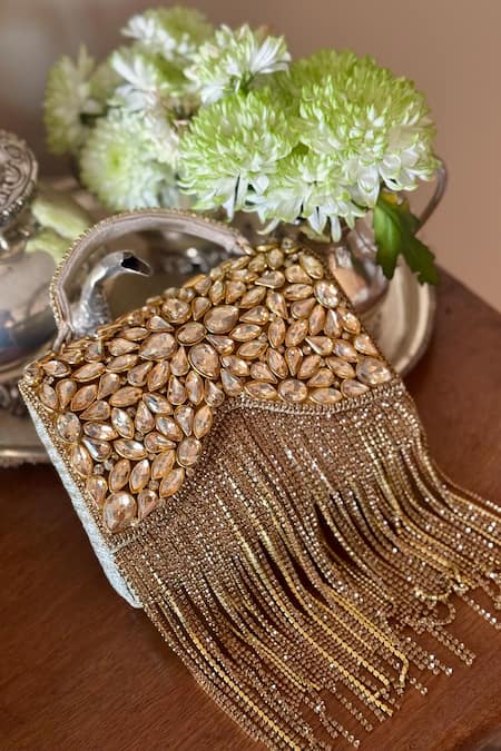 Bhavna Kumar Gold Crystals, Tassels Embellished Boho Clutch Online at Aza Fashions Bhavna Kumar_Gold Crystals, Tassels Embellished Boho Clutch_Online_at_Aza_Fashions