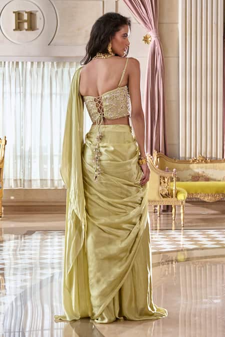 Paulmi And Harsh Pista Green Corset Blouse & Pre-draped Saree 