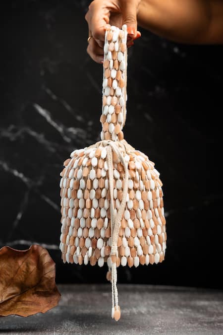 Buy Nayaab By Sonia Cream Beads Serenity Gilt Drops Rustic Aura Potli Online at Aza Fashions Buy_Nayaab By Sonia_Cream Beads Serenity Gilt Drops Rustic Aura Potli _Online_at_Aza_Fashions