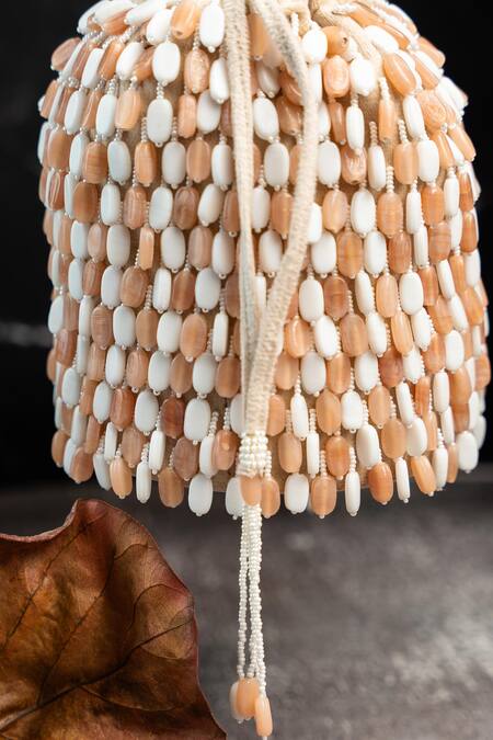 Shop Nayaab By Sonia Cream Beads Serenity Gilt Drops Rustic Aura Potli Online at Aza Fashions Shop_Nayaab By Sonia_Cream Beads Serenity Gilt Drops Rustic Aura Potli _Online_at_Aza_Fashions