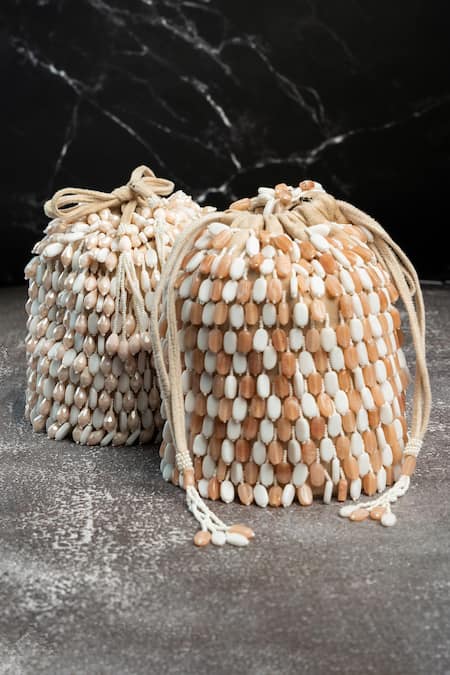 Nayaab By Sonia Cream Beads Serenity Gilt Drops Rustic Aura Potli at Aza Fashions Nayaab By Sonia_Cream Beads Serenity Gilt Drops Rustic Aura Potli _at_Aza_Fashions