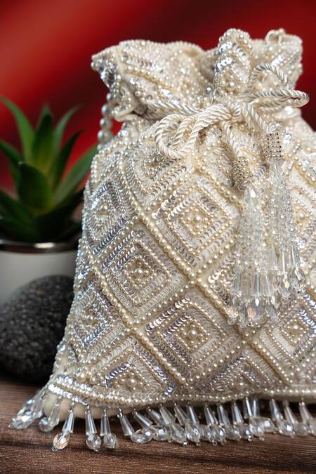 Shop_Nayaab By Sonia_White Embroidery, Pearls, Crystals Criss Cross Potli _Online_at_Aza_Fashions