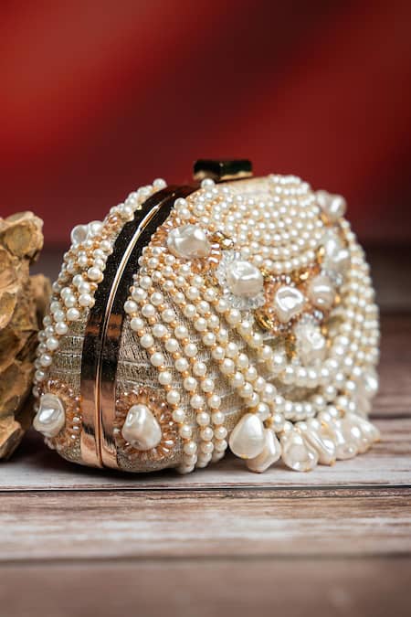 Shop Nayaab By Sonia Cream Pearls Adorn Kasse Gold Clutch Online at Aza Fashions Shop_Nayaab By Sonia_Cream Pearls Adorn Kasse Gold Clutch _Online_at_Aza_Fashions