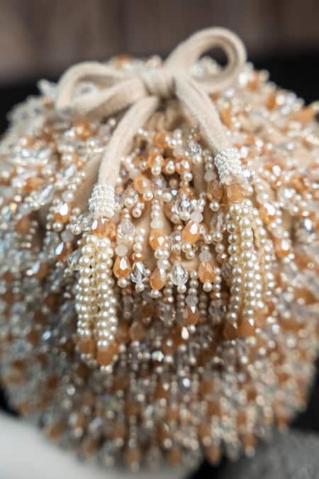 Nayaab By Sonia Cream Beads, Pearls Serenity Gilt Drops Oceanic Blush Potli Online at Aza Fashions Nayaab By Sonia_Cream Beads, Pearls Serenity Gilt Drops Oceanic Blush Potli _Online_at_Aza_Fashions