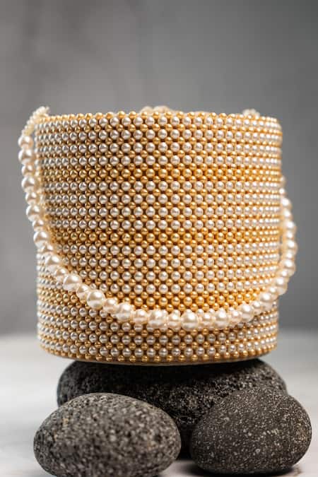 Buy Nayaab By Sonia Cream Pearls Dew Cascade Potli Online at Aza Fashions Buy_Nayaab By Sonia_Cream Pearls Dew Cascade Potli _Online_at_Aza_Fashions