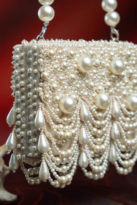 Shop Nayaab By Sonia Off White Pearls Oyster Kasse Ivory Clutch Online at Aza Fashions Shop_Nayaab By Sonia_Off White Pearls Oyster Kasse Ivory Clutch _Online_at_Aza_Fashions
