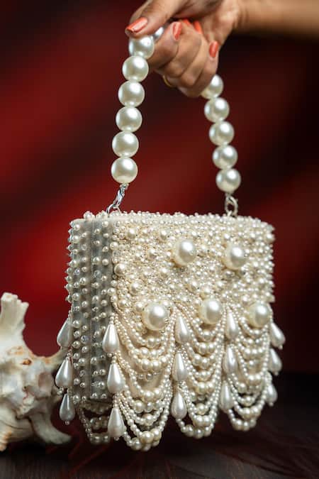 Nayaab By Sonia Off White Pearls Oyster Kasse Ivory Clutch at Aza Fashions Nayaab By Sonia_Off White Pearls Oyster Kasse Ivory Clutch _at_Aza_Fashions