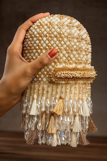 Buy_Nayaab By Sonia_Cream Beads, Tassels, Embroidery Damsel Criss Cross Ecru Potli _Online_at_Aza_Fashions