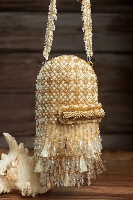 Shop_Nayaab By Sonia_Cream Beads, Tassels, Embroidery Damsel Criss Cross Ecru Potli _Online_at_Aza_Fashions