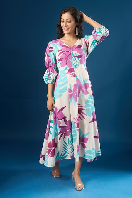 Naintara Bajaj Purple Cotton V-neck Floral Print Dress at Aza Fashions Naintara Bajaj_Purple Cotton V-neck Floral Print Dress _at_Aza_Fashions