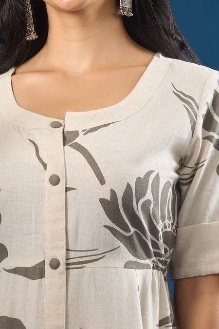 Naintara Bajaj Off White Cotton Round Neck Florette Print Dress at Aza Fashions Naintara Bajaj_Off White Cotton Round Neck Florette Print Dress _at_Aza_Fashions