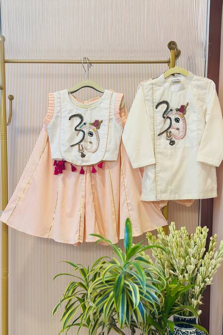 Rage Attire-Sweta Saria_Peach Tassels, Embroidery Om Ganehsa Crop Top Palazzo Set _Online_at_Aza_Fashions