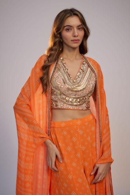 Nadima Saqib Orange Dupion, Silk, Crepe Sequins, Pearls V-neck, Open Printed Sharara Pant Set Online at Aza Fashions Nadima Saqib_Orange Dupion, Silk, Crepe Sequins, Pearls V-neck, Open Printed Sharara Pant Set _Online_at_Aza_Fashions