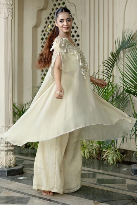 Buy Farha Syed Ivory Chiffon, Tissue Mirrors, Pearls, Cut Work V-neck Beige Kaftan Palazzo Set Online at Aza Fashions Buy_Farha Syed_Ivory Chiffon, Tissue Mirrors, Pearls, Cut Work V-neck Beige Kaftan Palazzo Set _Online_at_Aza_Fashions