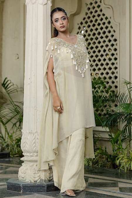 Shop Farha Syed Ivory Chiffon, Tissue Mirrors, Pearls, Cut Work V-neck Beige Kaftan Palazzo Set Online at Aza Fashions Shop_Farha Syed_Ivory Chiffon, Tissue Mirrors, Pearls, Cut Work V-neck Beige Kaftan Palazzo Set _Online_at_Aza_Fashions