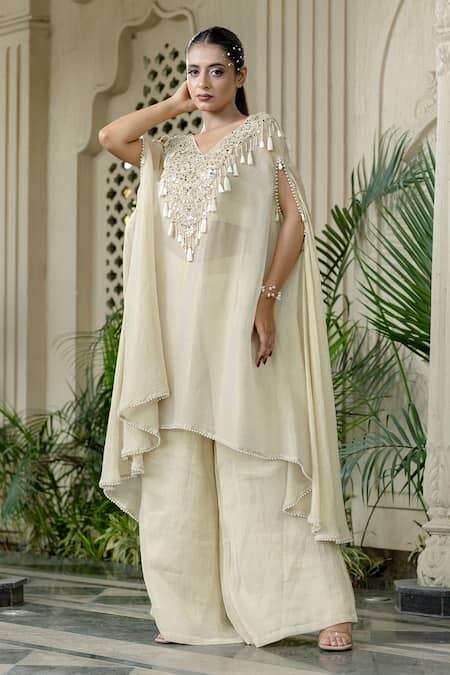 Farha Syed Ivory Chiffon, Tissue Mirrors, Pearls, Cut Work V-neck Beige Kaftan Palazzo Set at Aza Fashions Farha Syed_Ivory Chiffon, Tissue Mirrors, Pearls, Cut Work V-neck Beige Kaftan Palazzo Set _at_Aza_Fashions