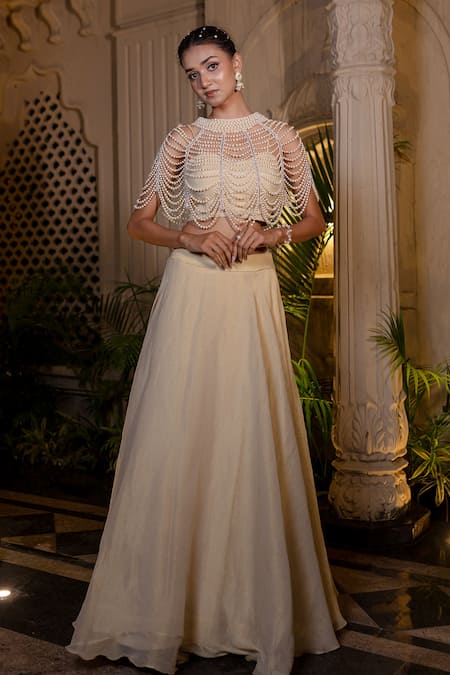 Shop_Farha Syed_Ivory Chiffon, Tissue, Taffeta Pearls, Sequins Beige Cape Lehenga Bustier Set _Online_at_Aza_Fashions