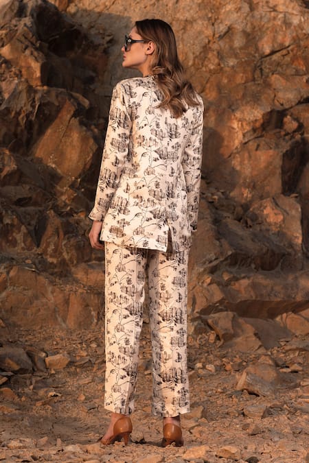 Shop AFRIYA White Linen, Satin Floral Reverie Trouser at Aza Fashions Shop_AFRIYA_White Linen, Satin Floral Reverie Trouser _at_Aza_Fashions