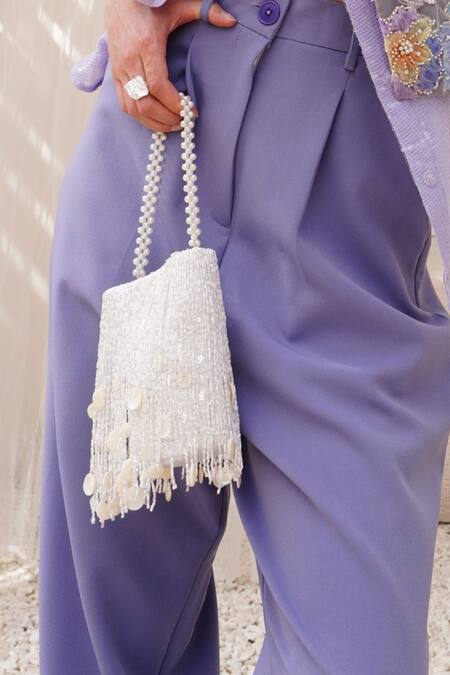 Plode_White Cut Work, Sequins Cutdana Tassel Embellished Potli _at_Aza_Fashions