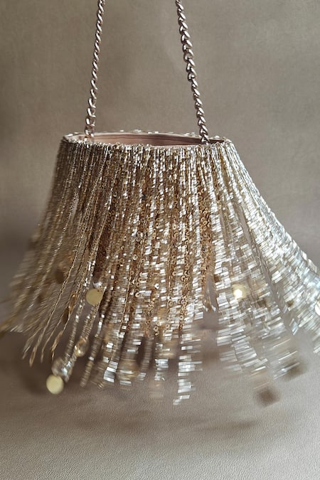 Buy Plode Gold Cut Work, Sequins Cutdana Embellished Potli Online at Aza Fashions Buy_Plode_Gold Cut Work, Sequins Cutdana Embellished Potli _Online_at_Aza_Fashions