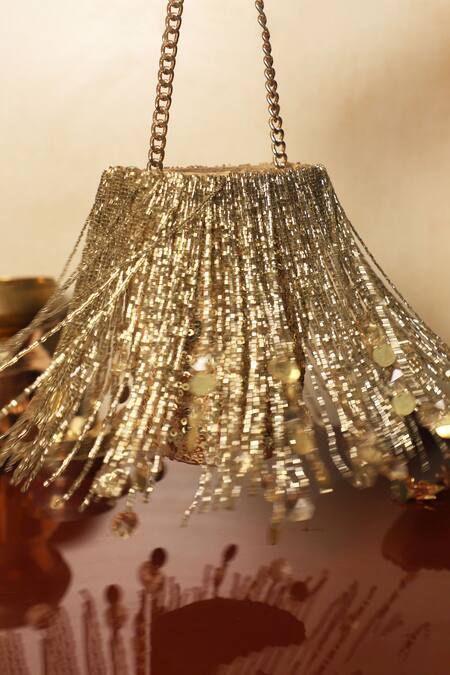 Buy Plode Gold Cut Work, Sequins Cutdana Embellished Potli Buy_Plode_Gold Cut Work, Sequins Cutdana Embellished Potli