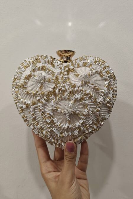 Shop_Plode_White Beads, Cut Work Hand Embellished Heart Clutch With Sling _Online_at_Aza_Fashions